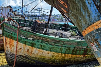 Boats moored on shore