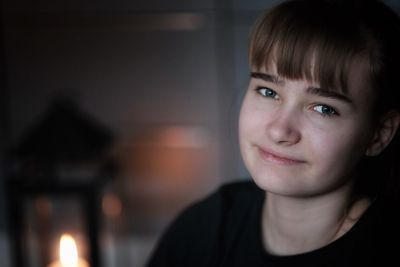 Close-up portrait of smiling girl 