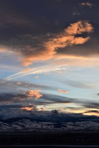 Low angle view of dramatic sky during sunset