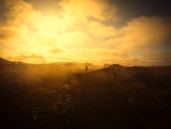 Scenic view of silhouette landscape against sky during sunset