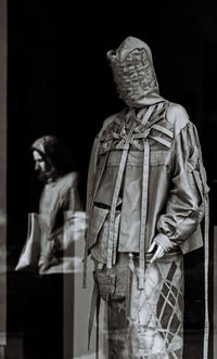 Rear view of woman standing outdoors