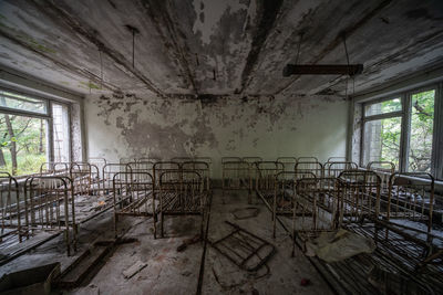 Abandoned cots in pripyat kindergarten 