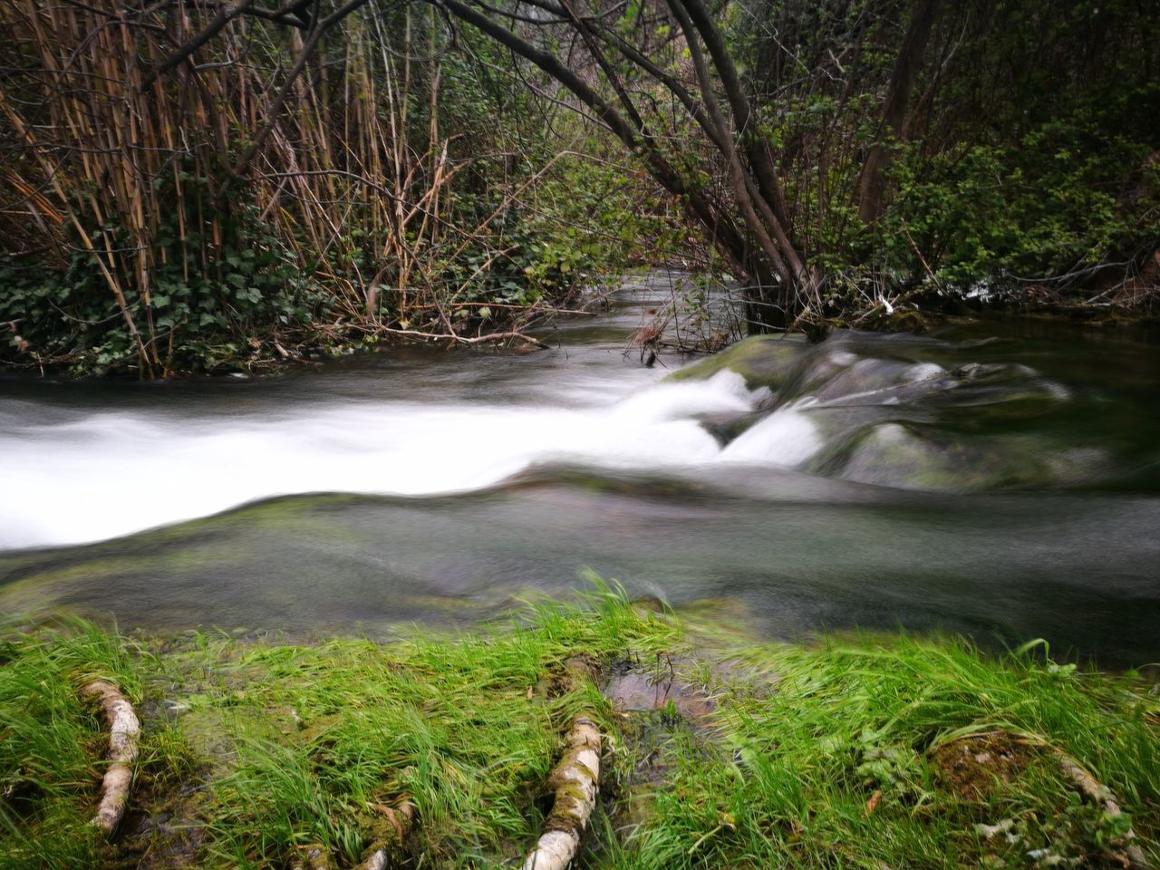 SCENIC VIEW OF WATERFALL