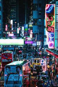 Illuminated city street at night