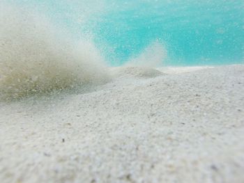 Close-up of sand on beach