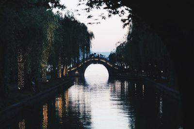 Bridge over river against sky