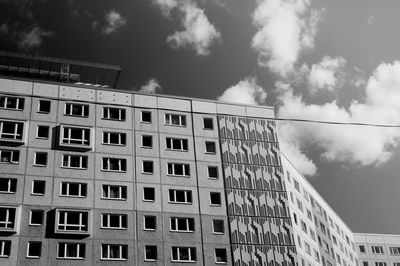 Low angle view of buildings against sky in city