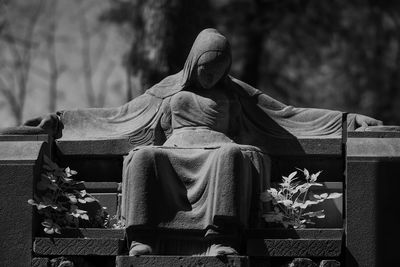 Human sculpture at graveyard