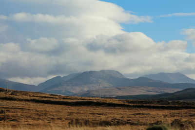 View of landscape against cloudy sky