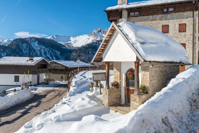 Winter magic. the ancient wooden houses of sauris di sopra. italy