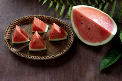 High angle view of fruits in plate on table