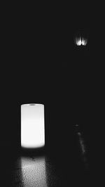 Illuminated lamp in dark room