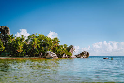 Scenic view of sea against blue sky