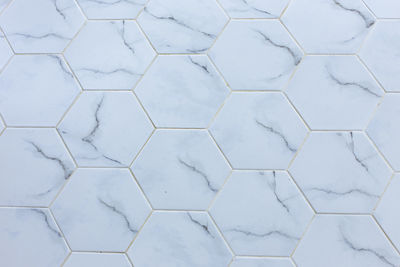 White hexagon marble tile wall for texture background .