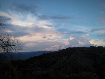 Low angle view of silhouette mountain against sky