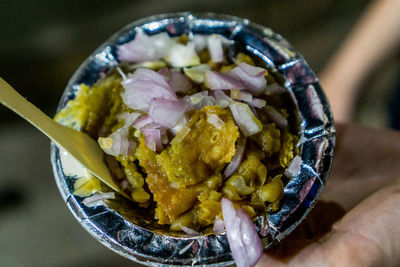 Close-up of hand holding food