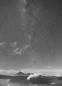 Scenic view of star field against sky at night