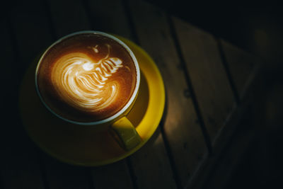 High angle view of cappuccino on table