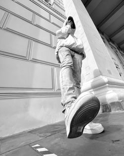 Low angle view of man on staircase