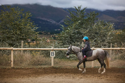 Man riding horse