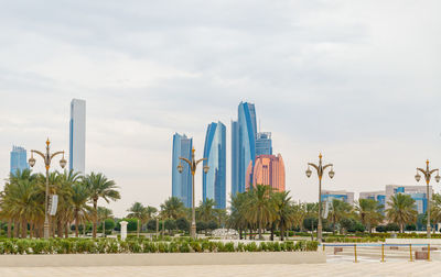 Buildings in city against sky