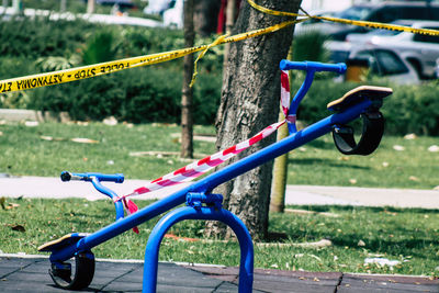 Close-up of empty swing in park