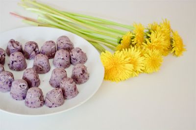 High angle view of dessert on white table