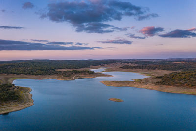 Drone panoramic aerial view of minutos dam in arraiolos alentejo at sunset, portugal