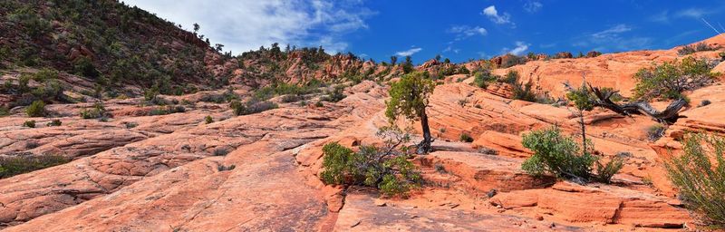 Panoramic view of rock formations against sky