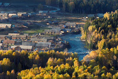 Scenic view of river by trees in autumn