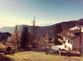 Houses on mountain range