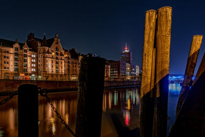 Illuminated buildings in city at night