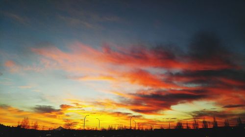 Scenic view of dramatic sky during sunset