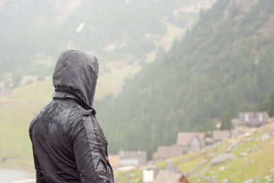 Rear view of man looking at mountain