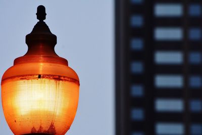 Illuminated lamp by building