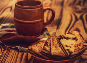 Close-up of coffee cup on table