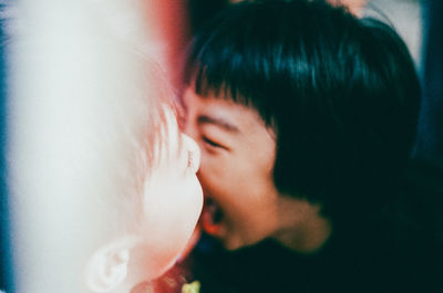 Close-up of woman looking away