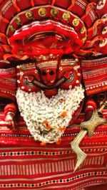 Close-up of red mask