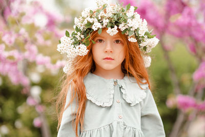 Portrait of girl wearing wreath