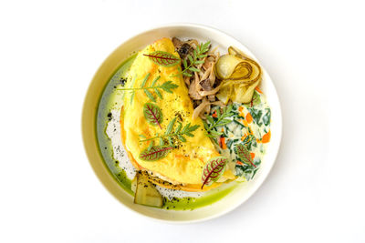 High angle view of food in bowl on white background