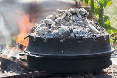 Close-up of fire on barbecue grill