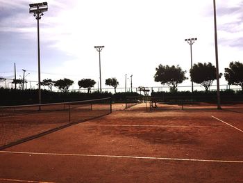 Empty basketball court against sky