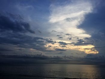 Scenic view of sea against sky at sunset