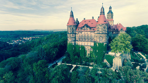 View of castle on mountain against sky