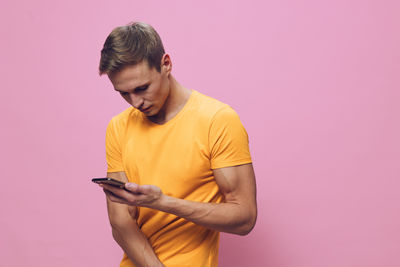 Young man using mobile phone
