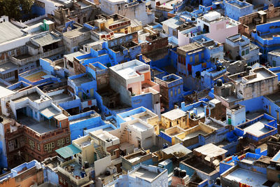 High angle view of buildings on sunny day in city