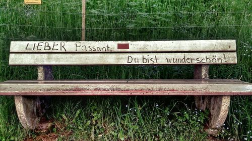 Information sign on wooden post