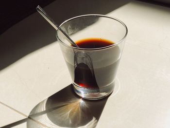 Close-up of tea in glass on table