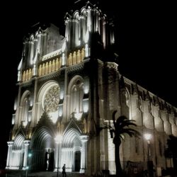 Low angle view of illuminated historical building