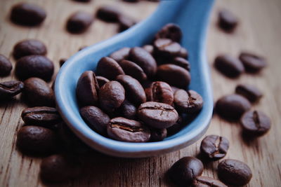 Close-up of coffee beans on table